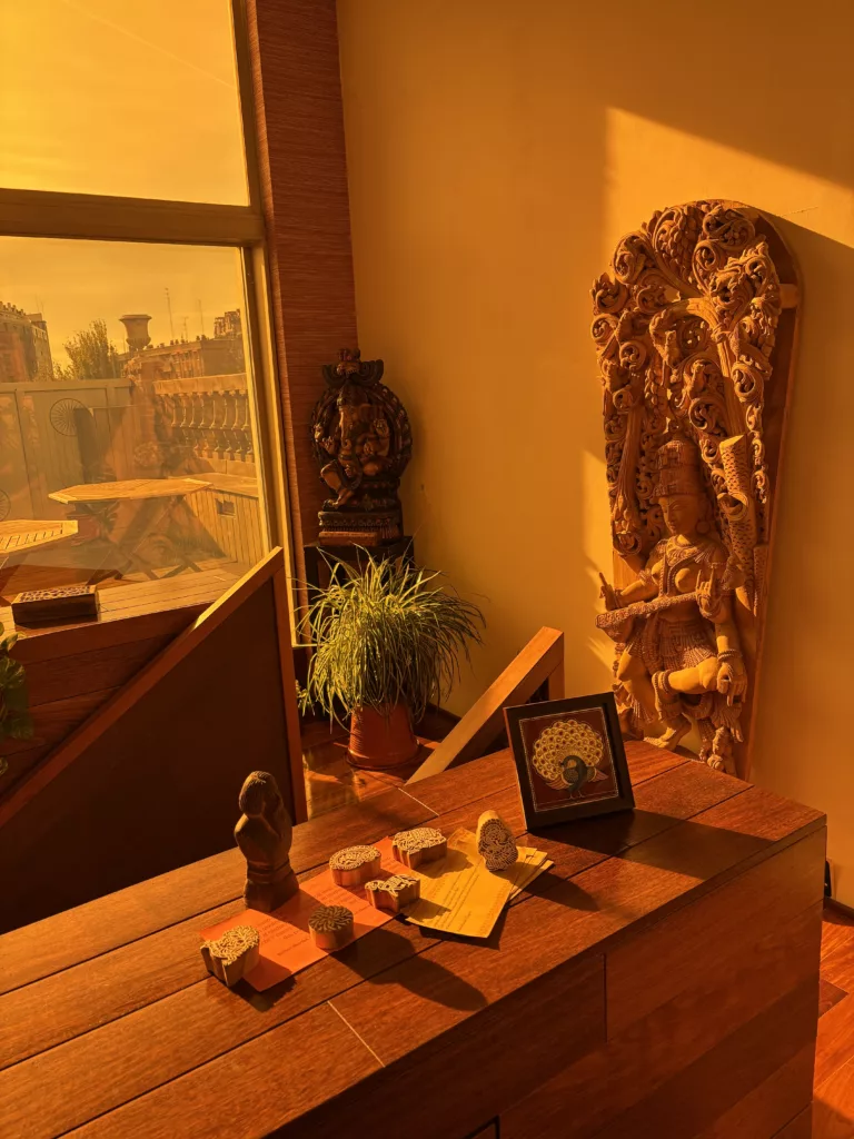 One of the beautiful spaces of Casa de la India, Valladolid. With traditional indian figures, idols and decoration.